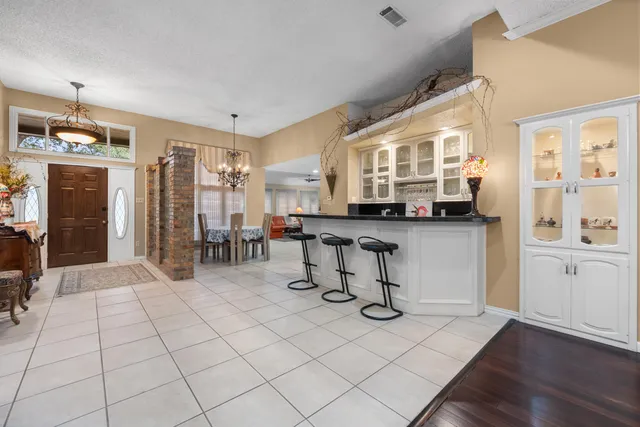 a room with lots of table and chair