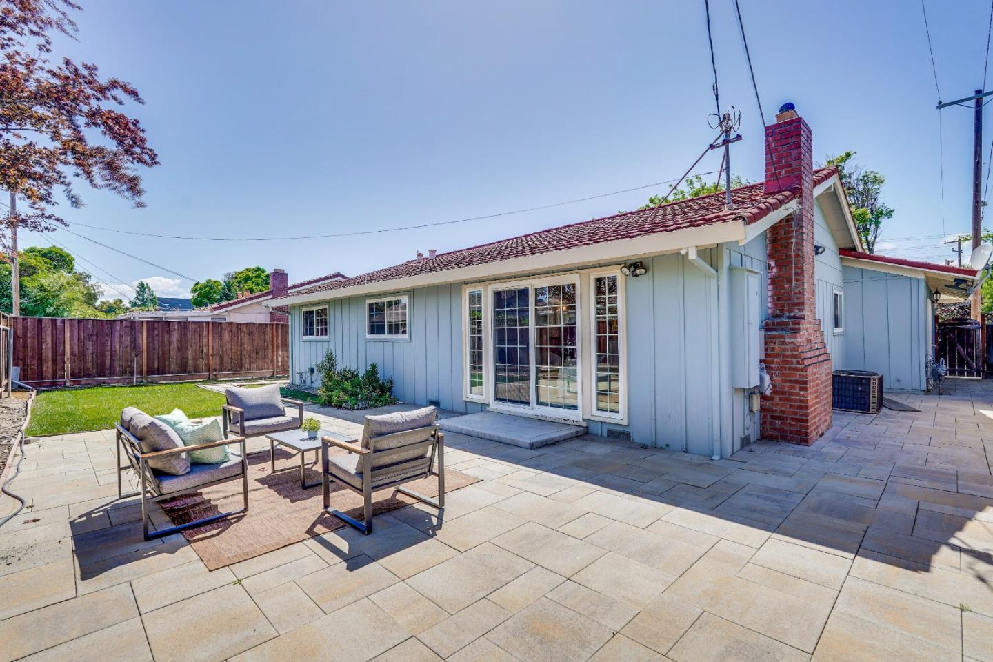 1755 Ravizza Avenue Santa Clara, CA 95051 - Photo 35 of 36 a view of a house with backyard sitting area and garden