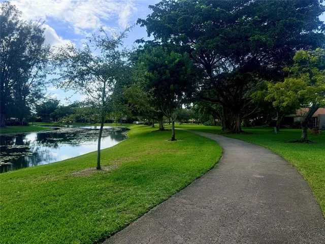 a view of a park with swings