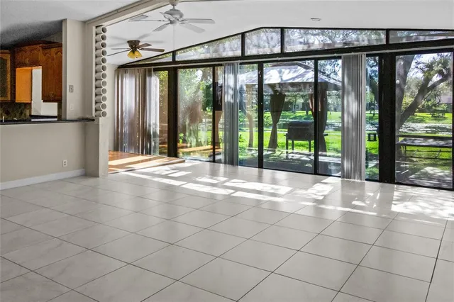 a view of an empty room with a balcony