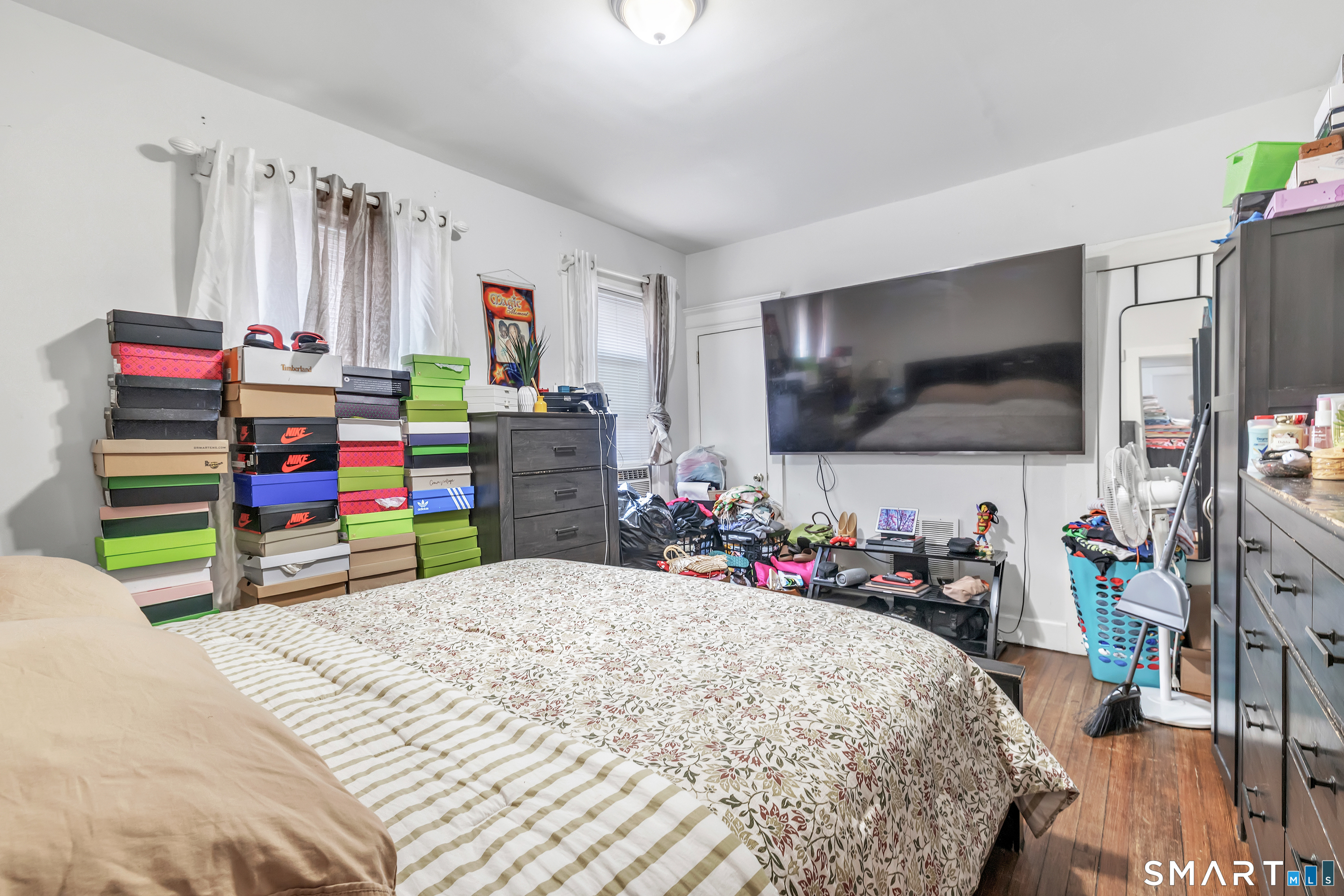 189 Wells Street Bridgeport, CT 06606 - Photo 37 of 40 1st Floor - Offers 1389 sq ft - Primary Bedroom offers Hardwood Floors