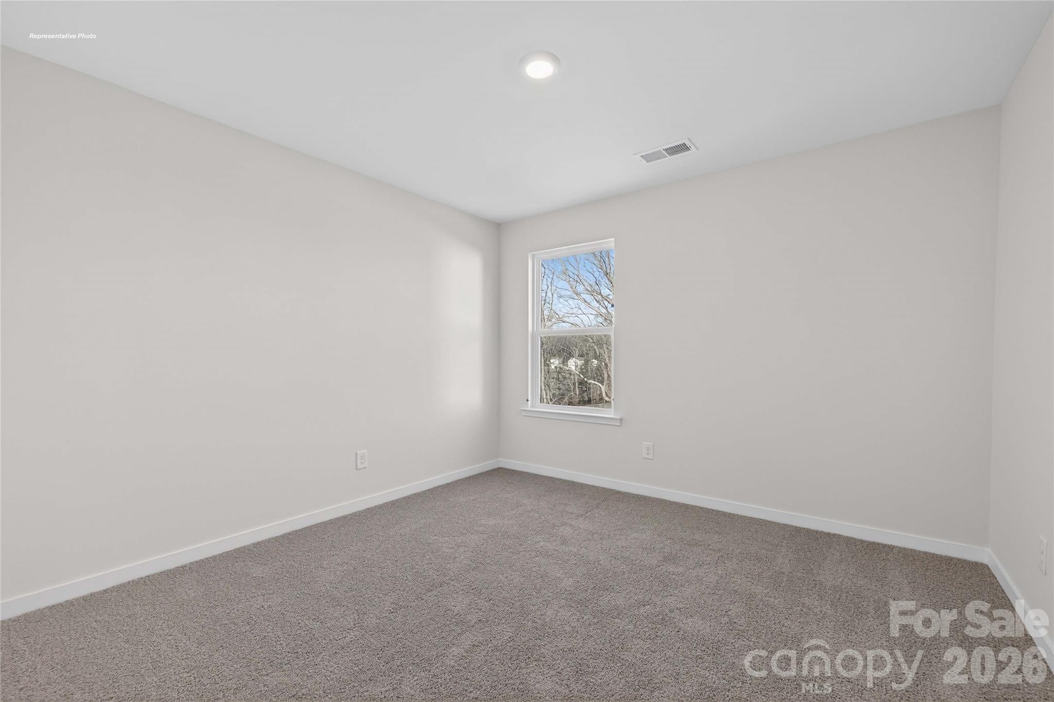 1375 Mammoth Road Hickory, NC 28602 - Photo 18 of 20 a view of an empty room with a window