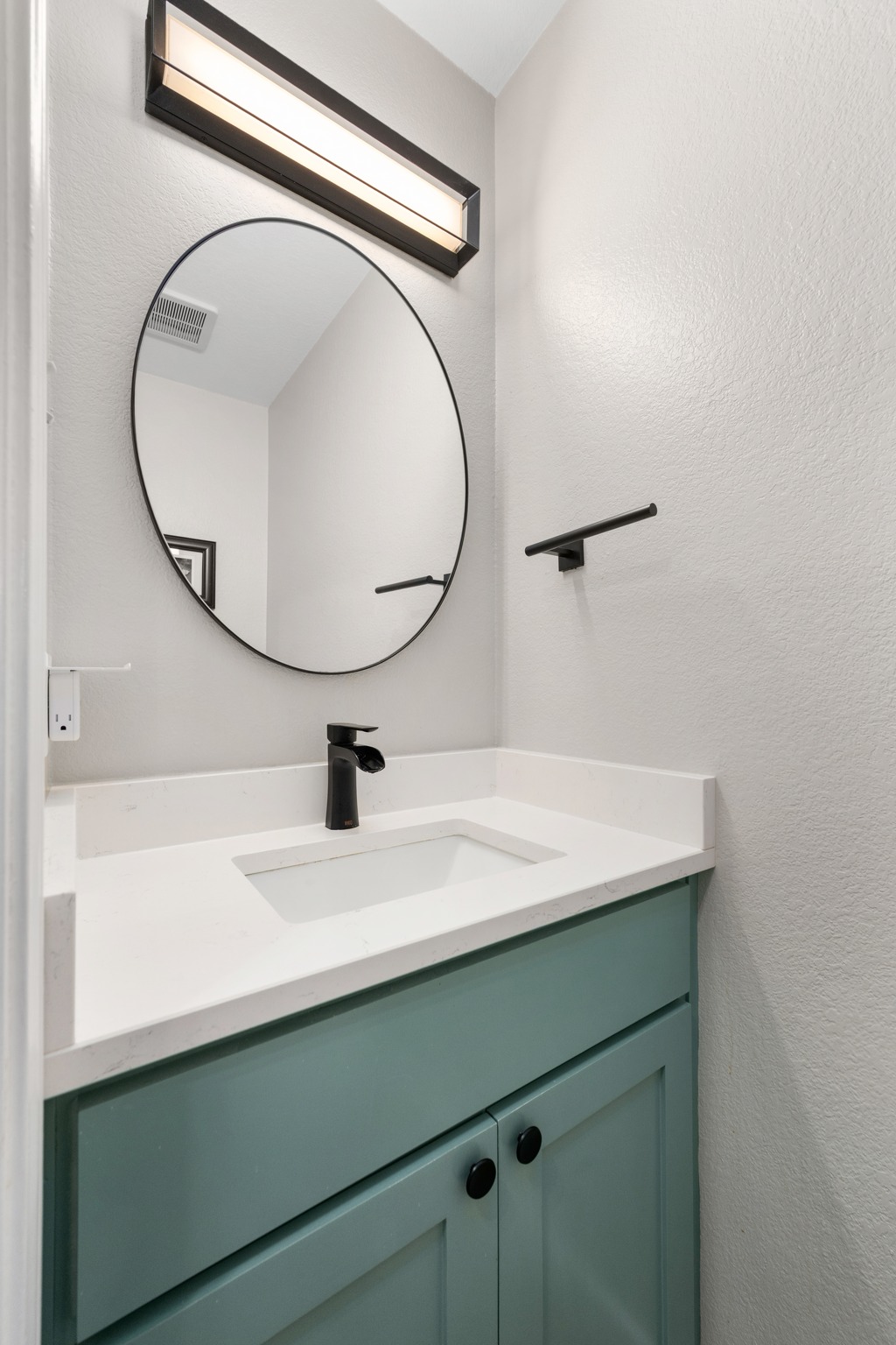3408 Ruby Red Drive Austin, TX 78728 - Photo 12 of 26 a bathroom with a sink a mirror and vanity