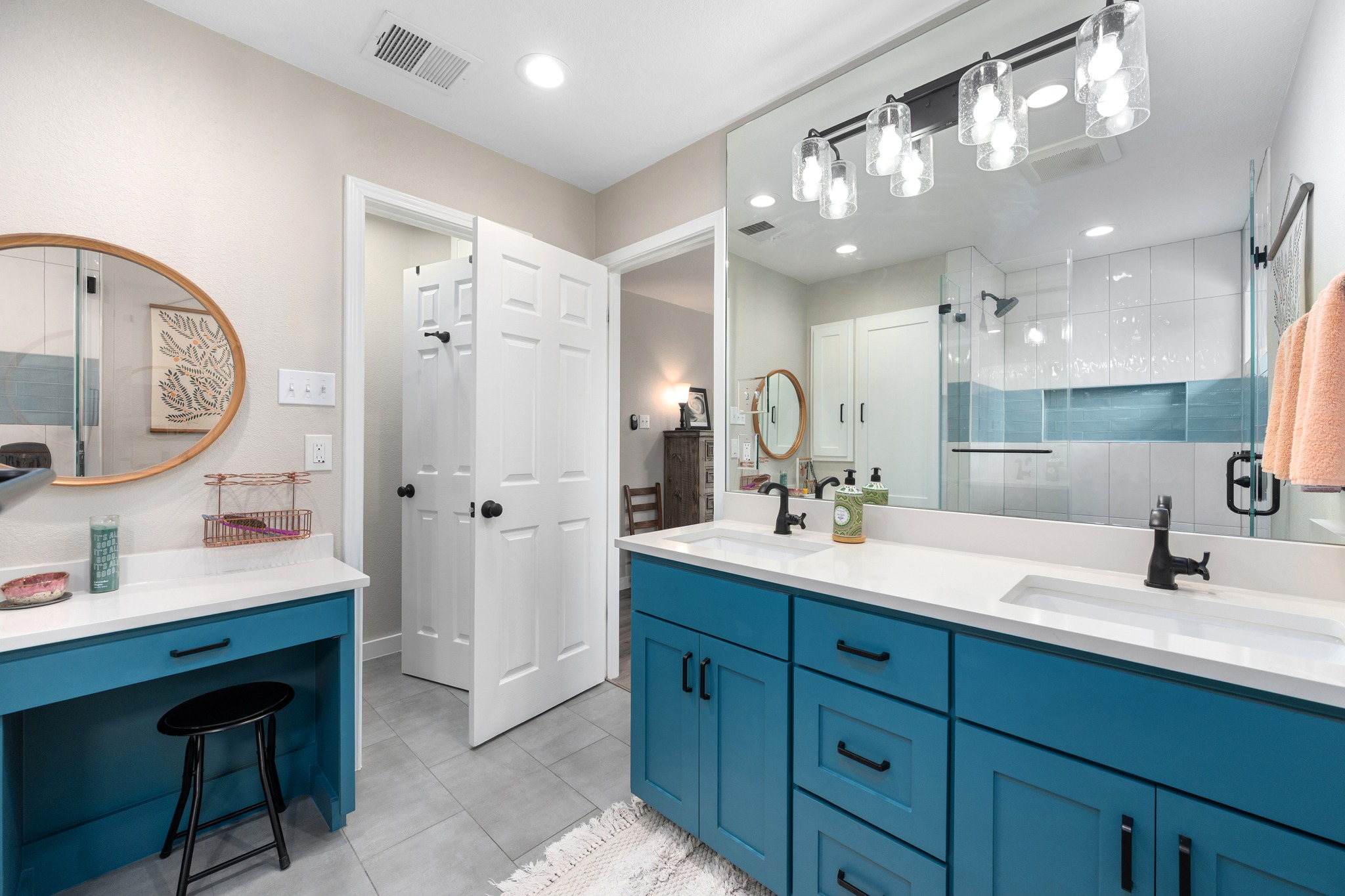 3408 Ruby Red Drive Austin, TX 78728 - Photo 16 of 26 a bathroom with a double vanity sink mirror and shower