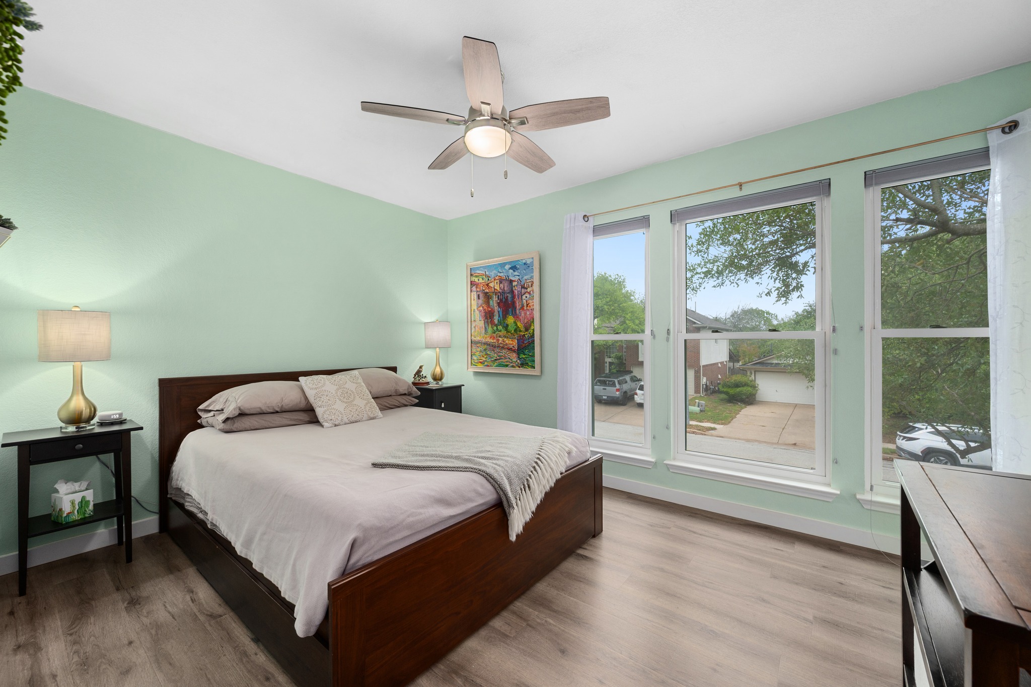 3408 Ruby Red Drive Austin, TX 78728 - Photo 17 of 26 a bedroom with a large bed and a window