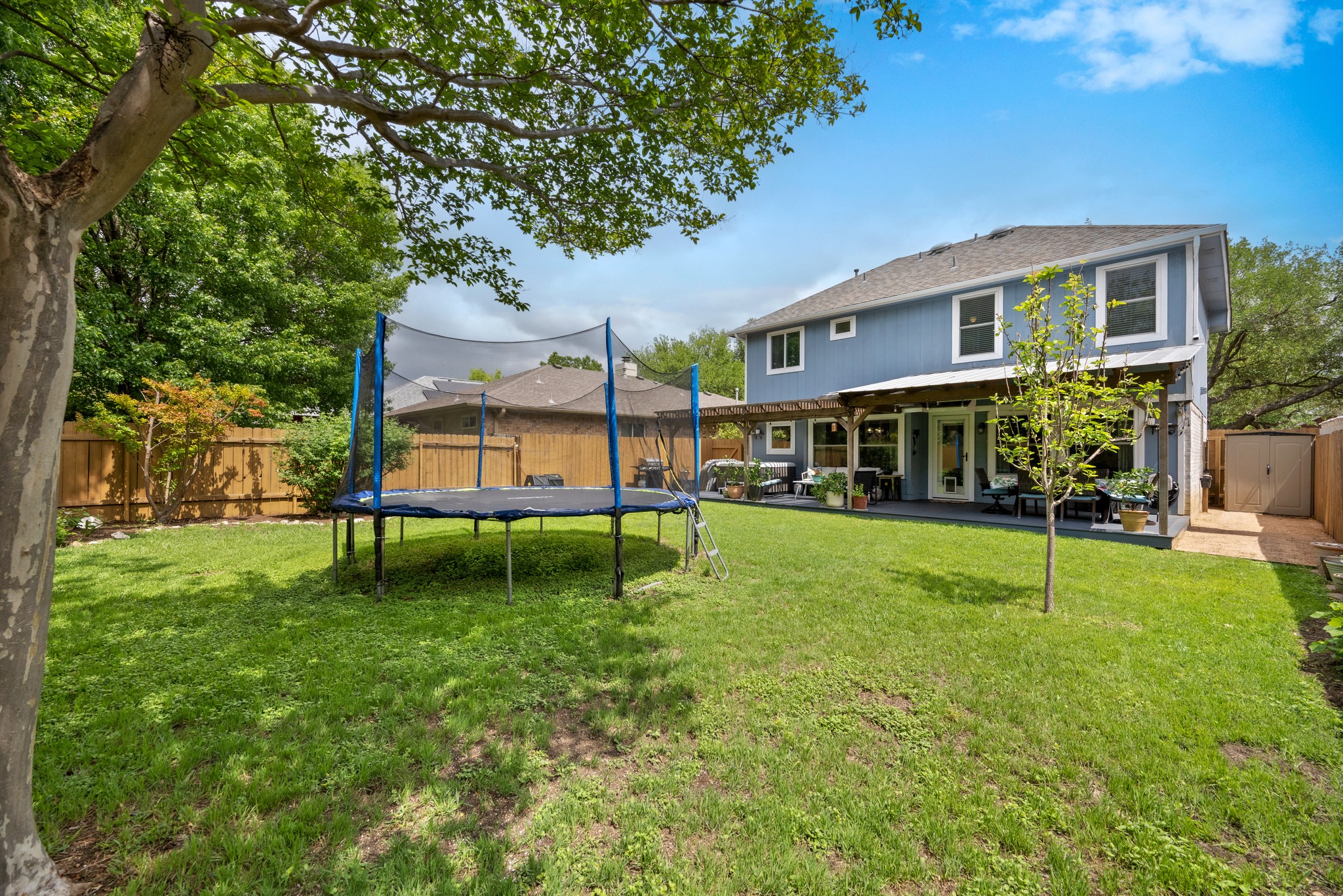 3408 Ruby Red Drive Austin, TX 78728 - Photo 25 of 26 a view of house with a backyard