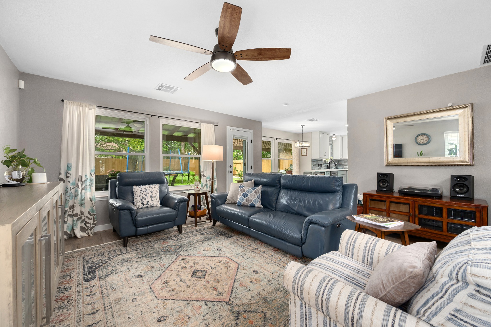 3408 Ruby Red Drive Austin, TX 78728 - Photo 4 of 26 a living room with furniture or couches and a large window