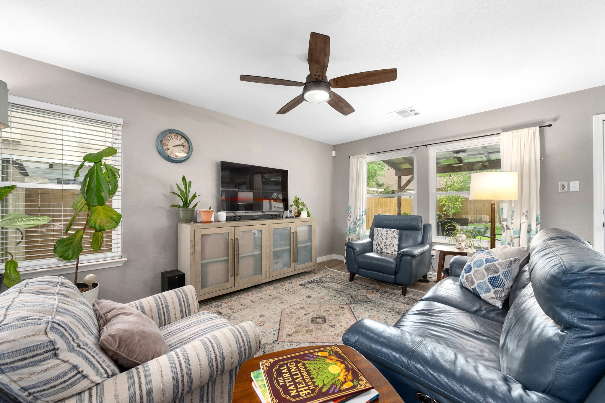 3408 Ruby Red Drive Austin, TX 78728 - Photo 5 of 26 a living room with furniture and a flat screen tv