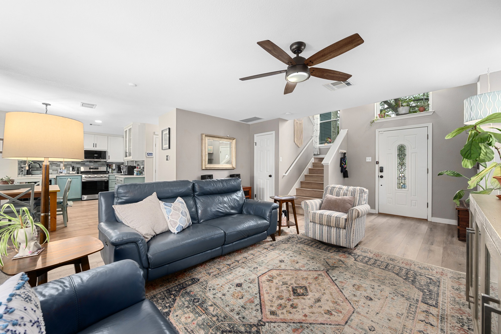 3408 Ruby Red Drive Austin, TX 78728 - Photo 6 of 26 a living room with furniture and kitchen view