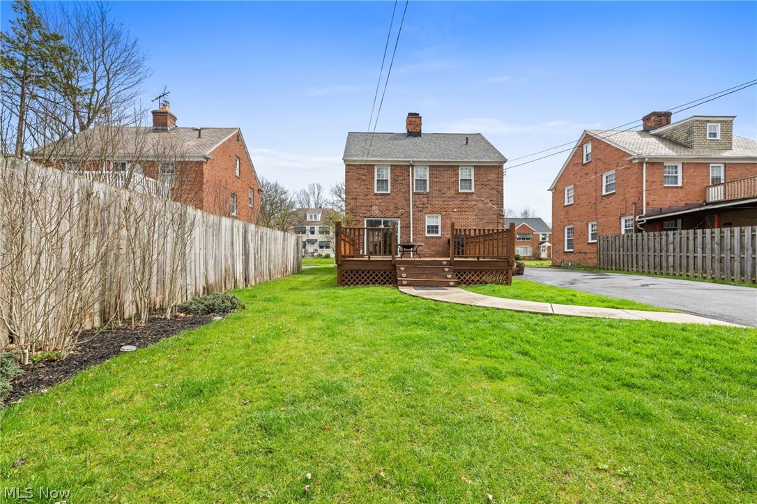 2368 Ashurst Road Cleveland, OH 44118 - Photo 20 of 20 Rear view of house with a wooden deck and a lawn