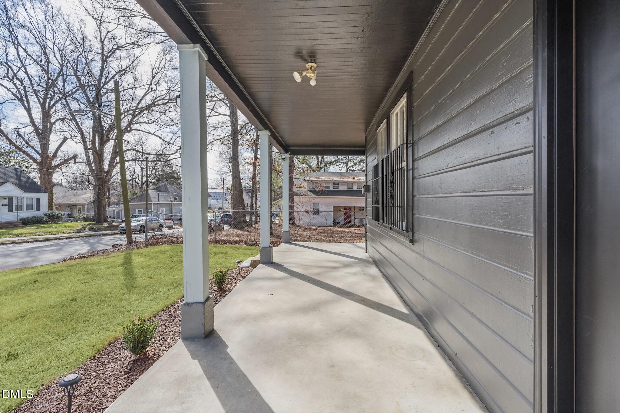 705 North Driver Street Durham, NC 27703 - Photo 7 of 46 a view of a house with a porch