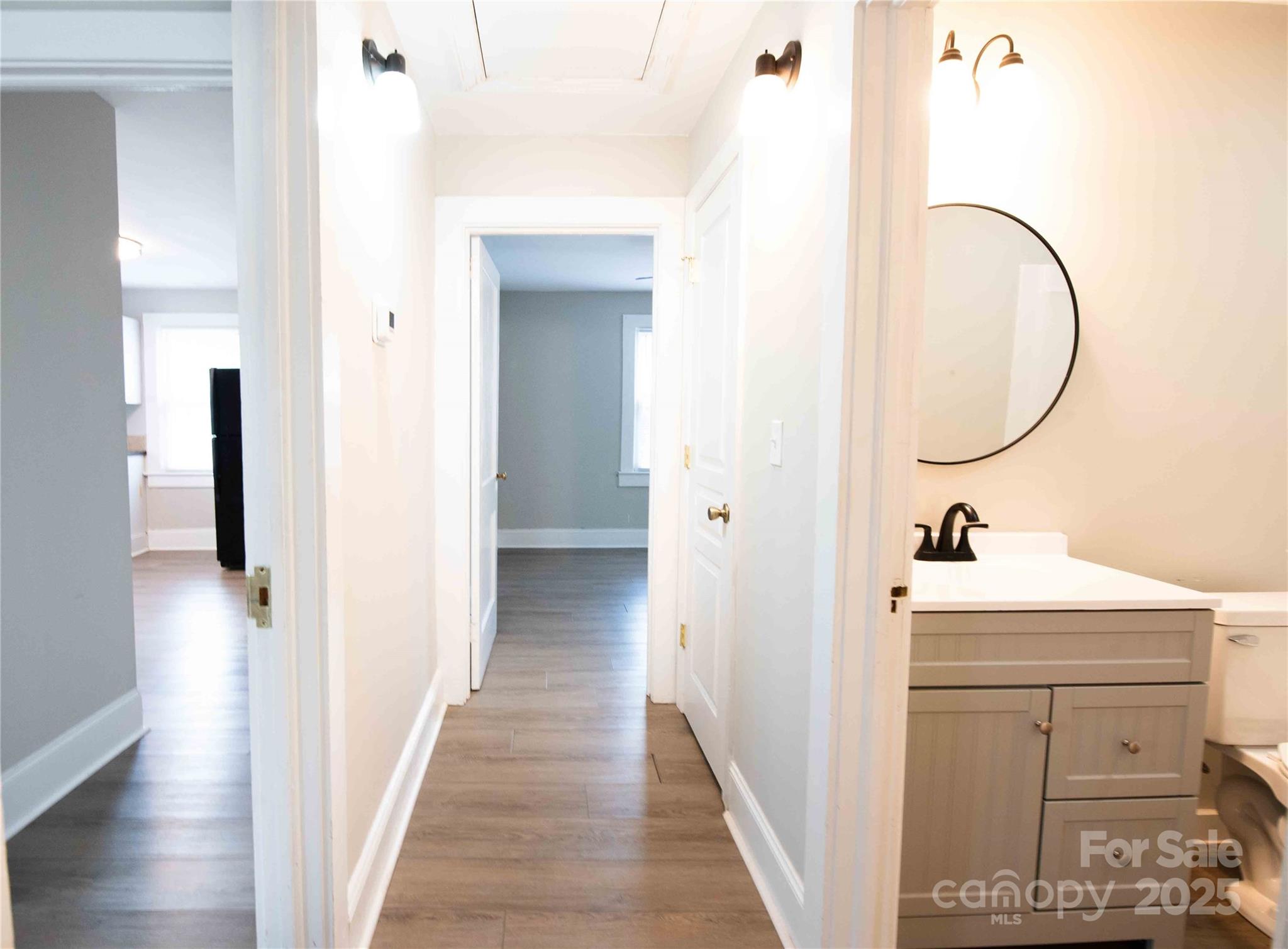 207 North Love Chapel Road Stanfield, NC 28163 - Photo 17 of 21 a bathroom with a sink and a mirror