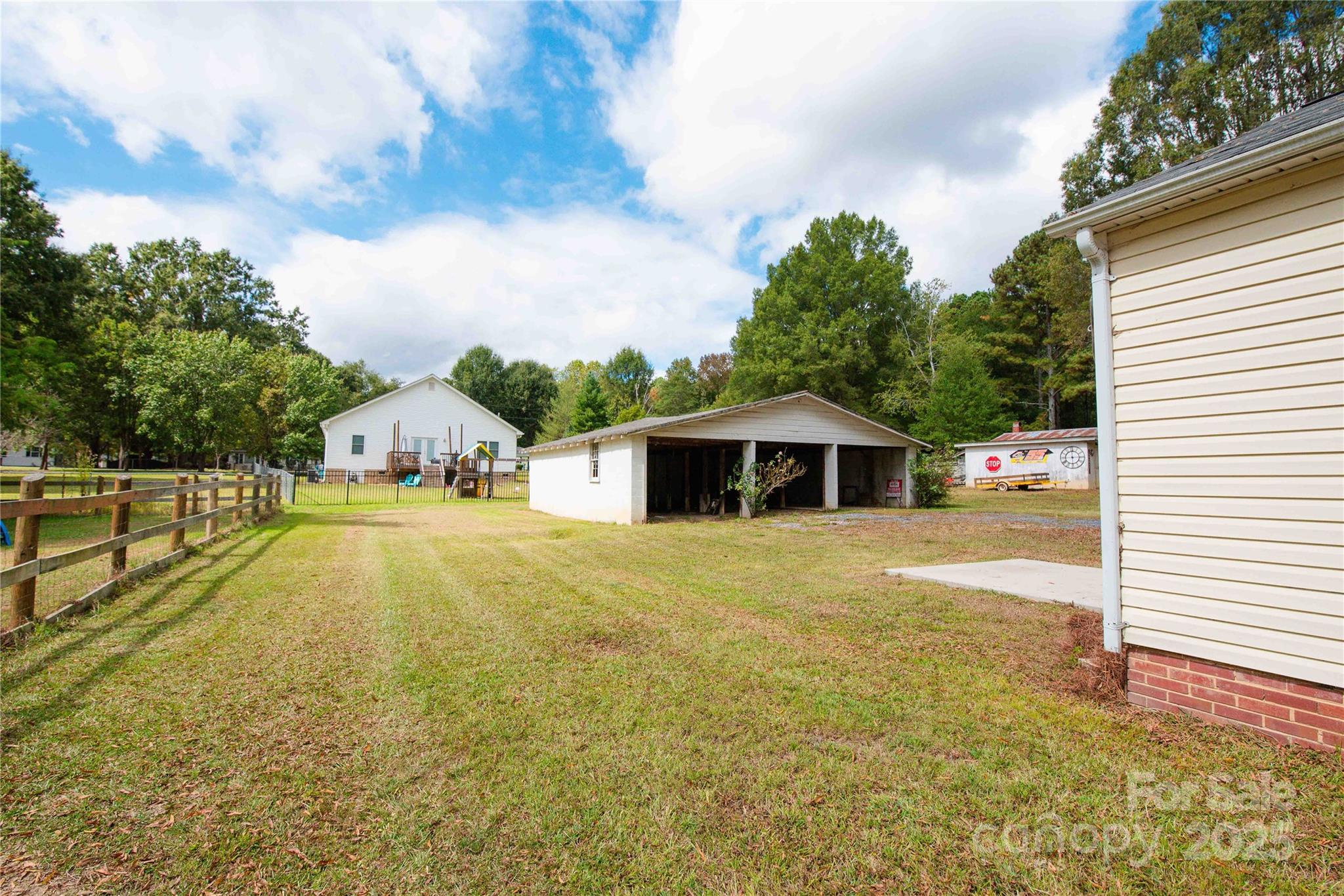 207 North Love Chapel Road Stanfield, NC 28163 - Photo 21 of 21 a view of a house with a yard