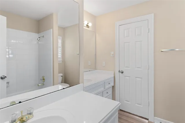 a bathroom with a sink and a shower