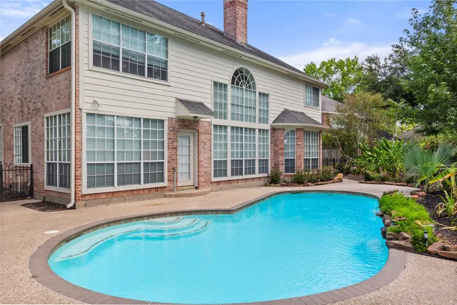 a view of outdoor space yard swimming pool and porch