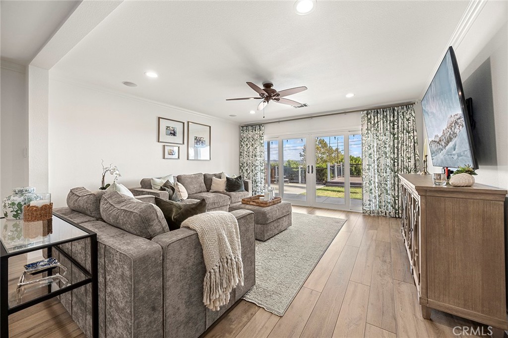 15914 West Road Whittier, CA 90603 - Photo 11 of 47 a living room with furniture a large window and a chandelier