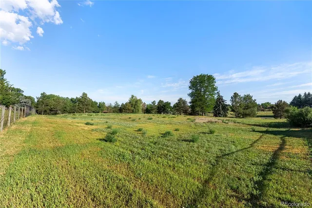 a view of an outdoor space and a yard
