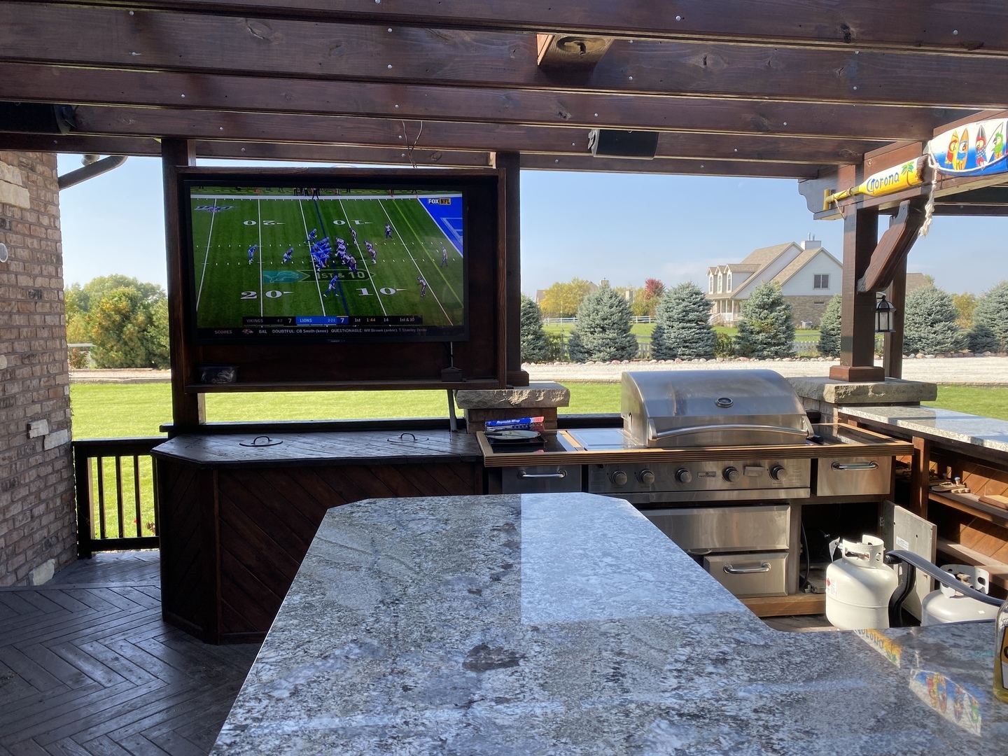 15646 West Barr Road Manhattan, IL 60442 - Photo 6 of 13 a living room with a rug table and a floor to ceiling window