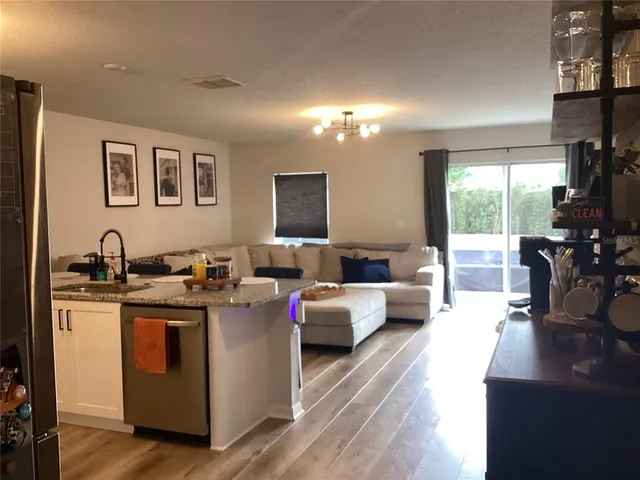 a view of front door with outdoor seating