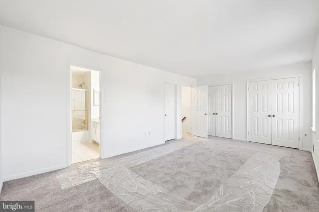 an empty room with a natural light