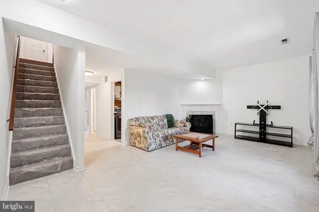 a view of livingroom with furniture and lounge chair