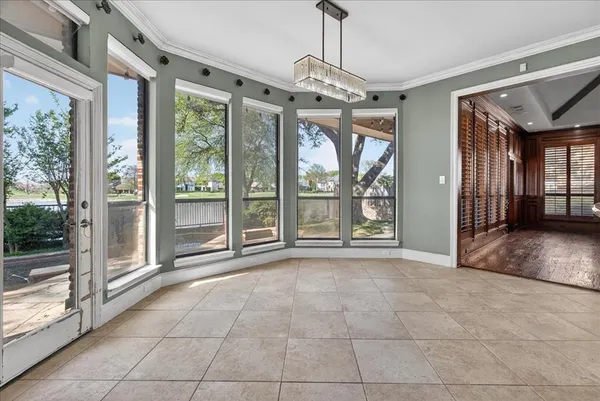 a view of an empty room with a balcony