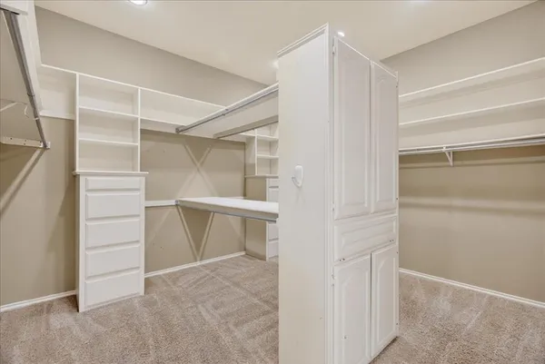 a view of an empty walk in closet