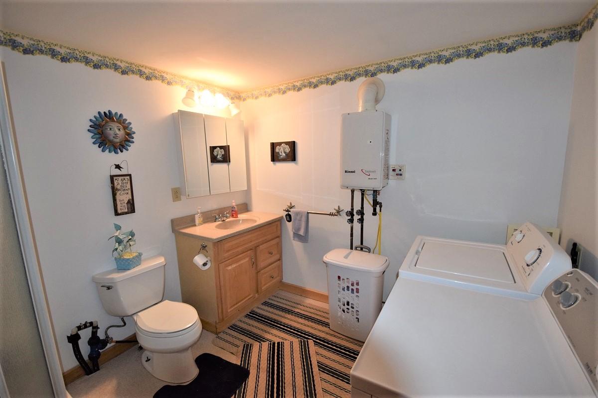 119 Rooks Road Eddington, ME 04428 - Photo 16 of 28 Bathroom with washer/dryer...