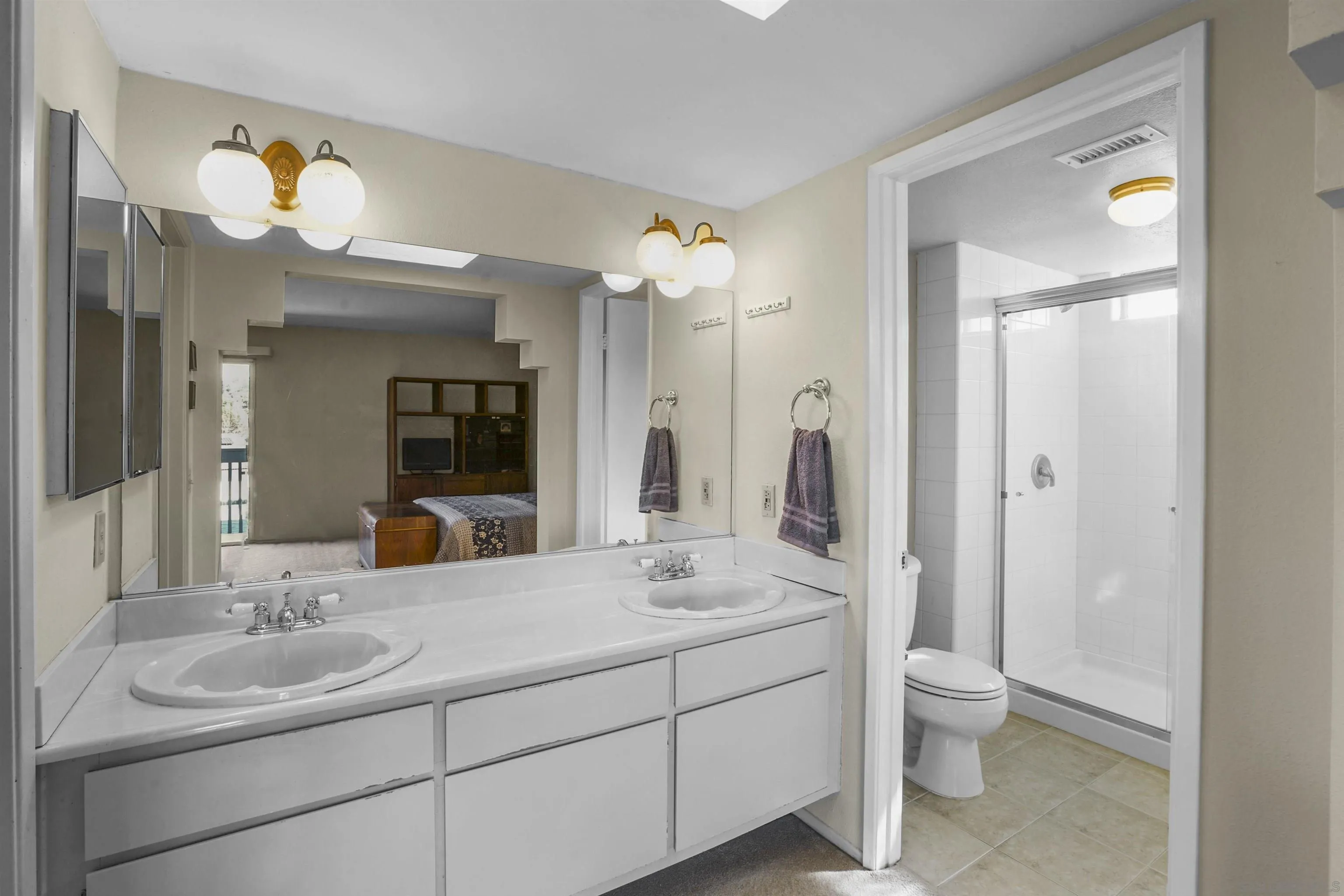 2119 Packard Place El Cajon, CA 92019 - Photo 17 of 29 a bathroom with a sink double vanity and a mirror
