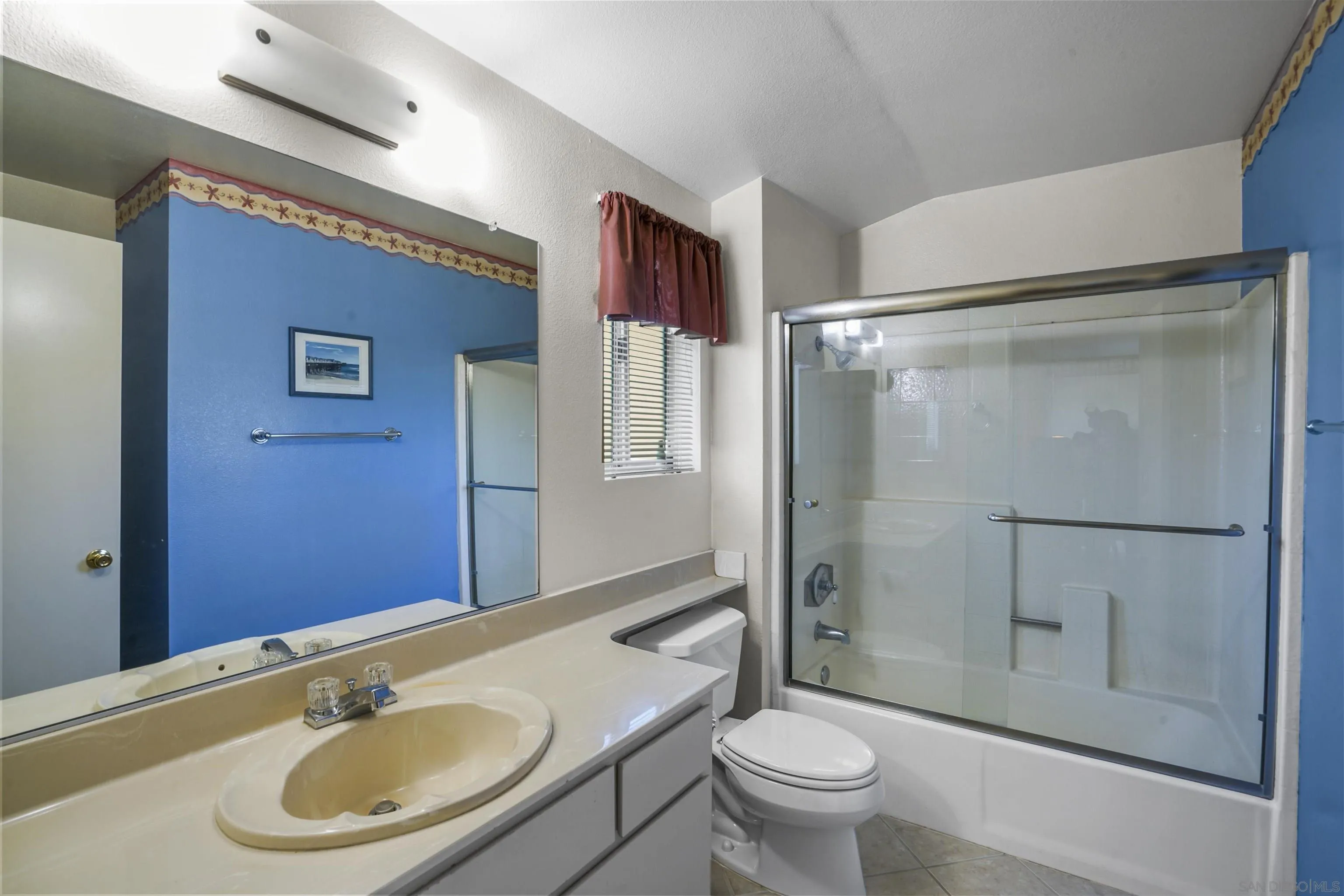 2119 Packard Place El Cajon, CA 92019 - Photo 21 of 29 a bathroom with a sink toilet and shower