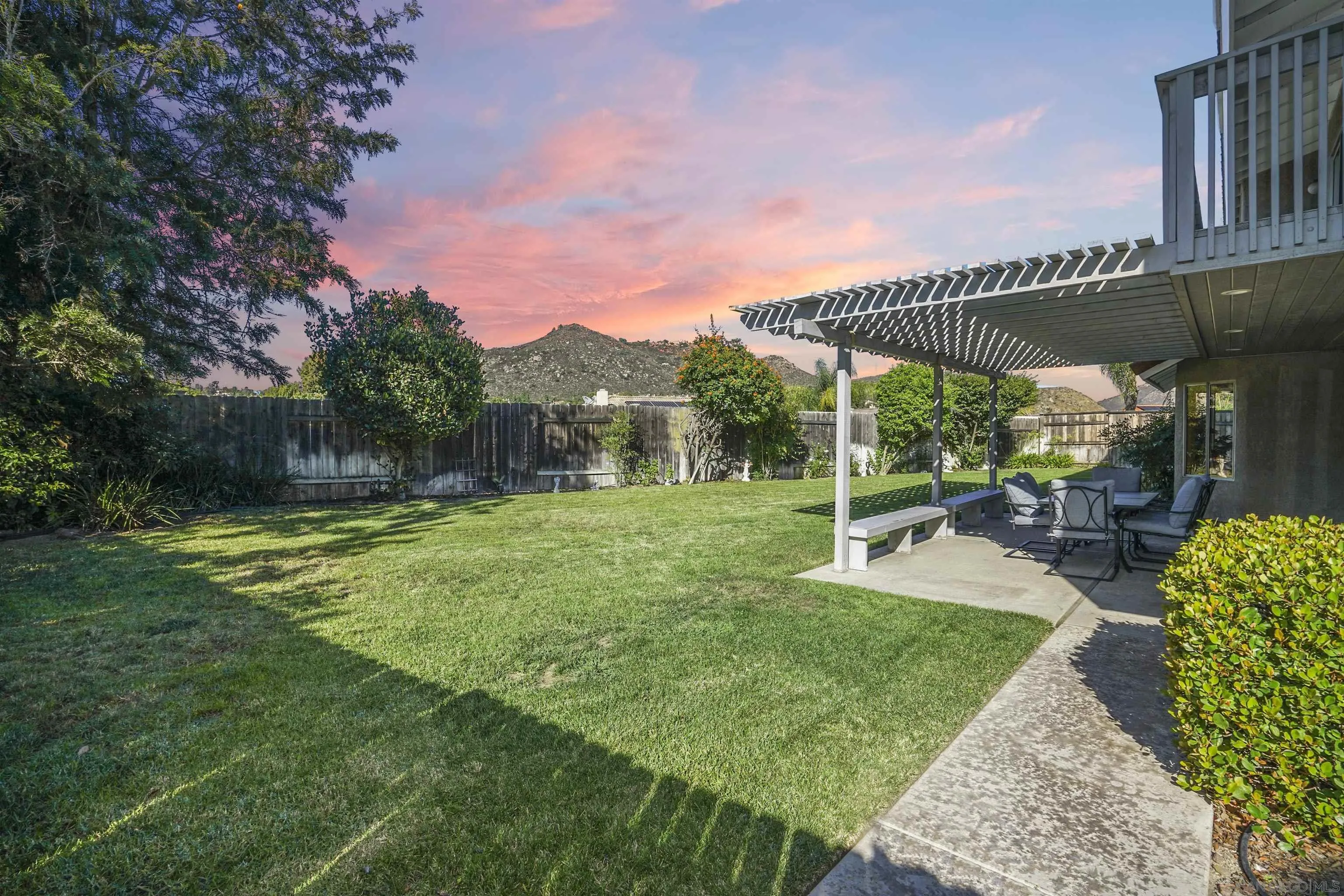 2119 Packard Place El Cajon, CA 92019 - Photo 28 of 29 a view of a patio with a table and chairs