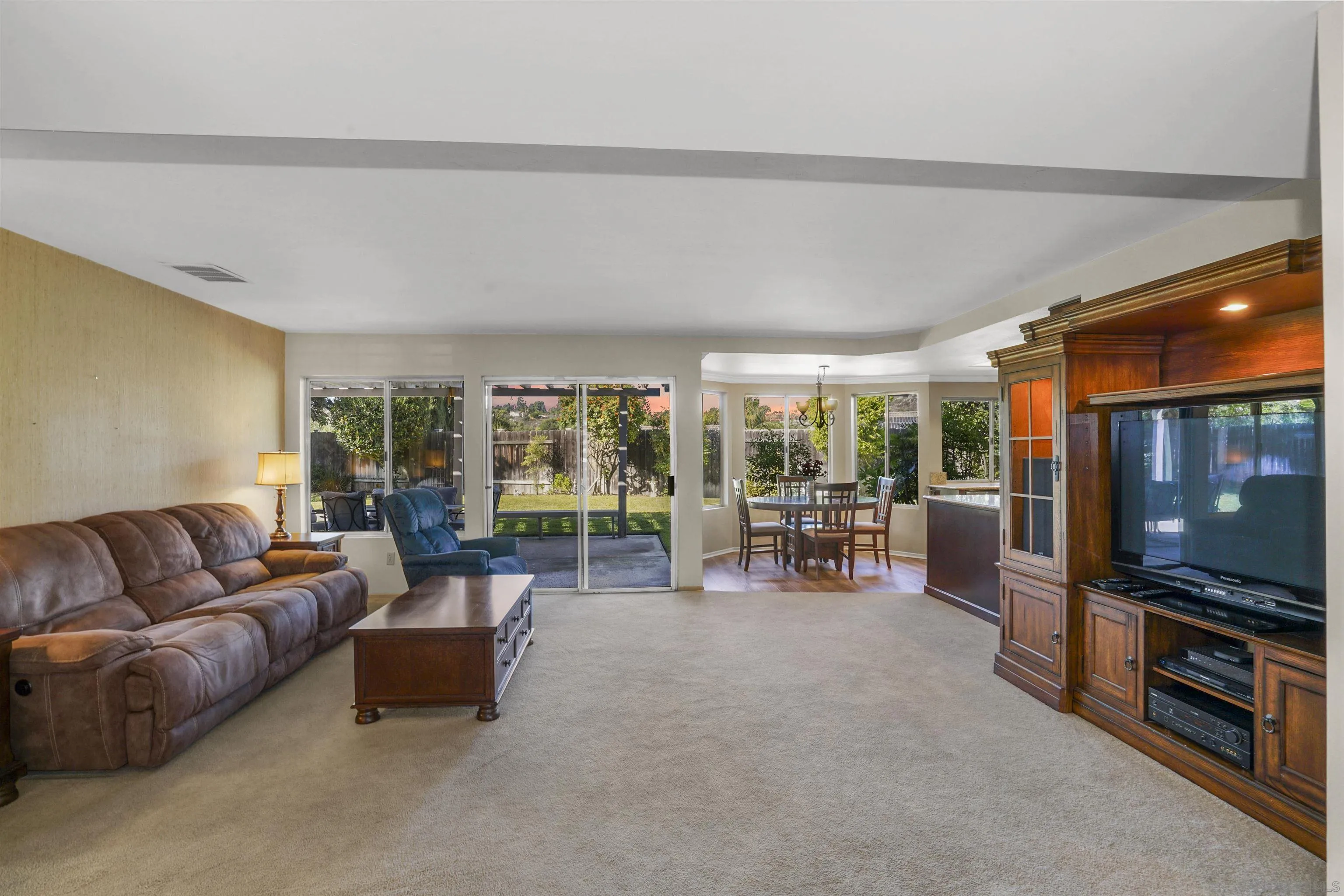 2119 Packard Place El Cajon, CA 92019 - Photo 4 of 29 a living room with furniture and a flat screen tv