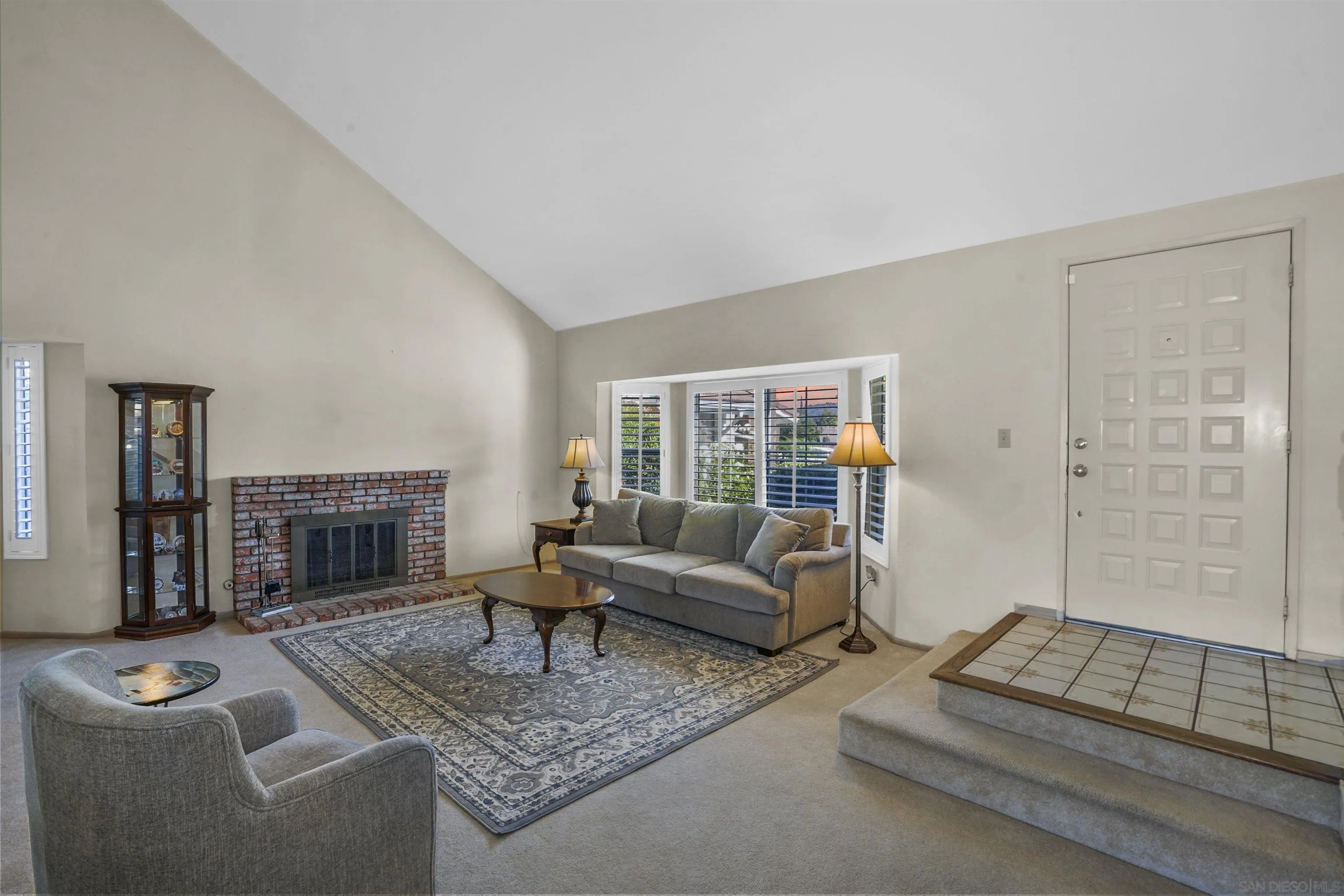 2119 Packard Place El Cajon, CA 92019 - Photo 8 of 29 a living room with furniture and a fireplace