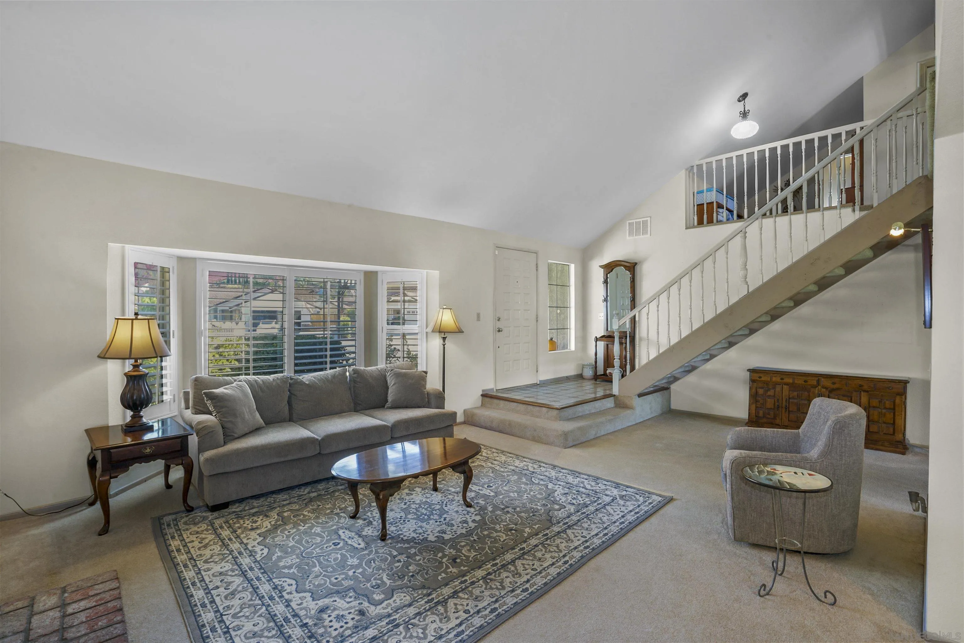 2119 Packard Place El Cajon, CA 92019 - Photo 9 of 29 a living room with furniture and a rug