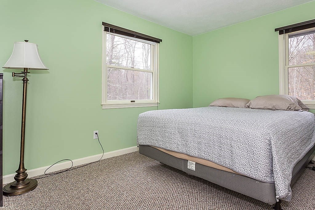7 Nevada Road Chelmsford, MA 01824 - Photo 12 of 21 a bedroom with a bed and a window