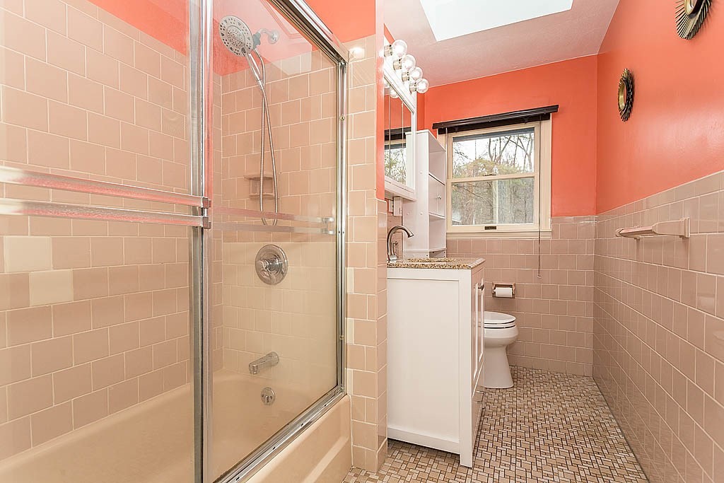7 Nevada Road Chelmsford, MA 01824 - Photo 15 of 21 a bathroom with a shower a toilet and a sink
