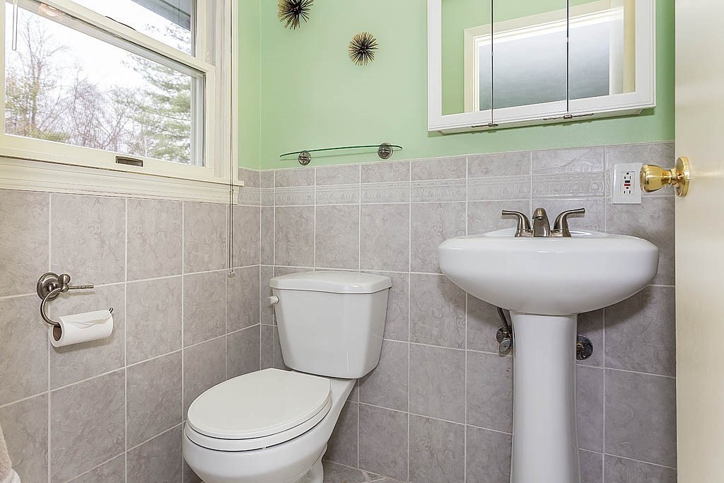 7 Nevada Road Chelmsford, MA 01824 - Photo 16 of 21 a bathroom with a sink toilet and a mirror