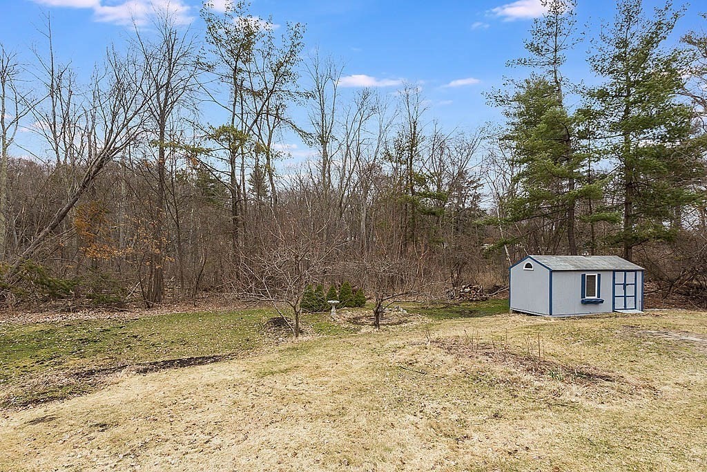 7 Nevada Road Chelmsford, MA 01824 - Photo 19 of 21 a house view with a backyard space