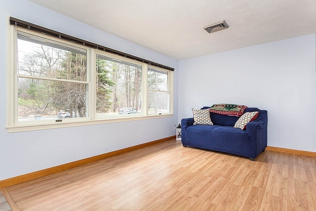 7 Nevada Road Chelmsford, MA 01824 - Photo 4 of 21 a living room with furniture and a window
