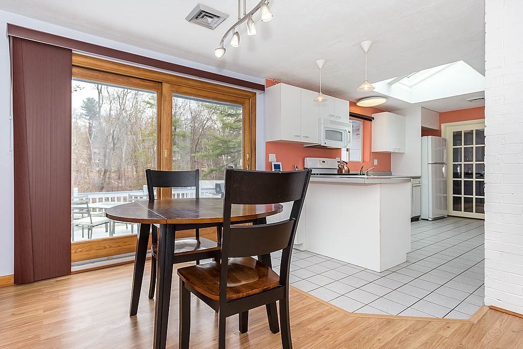 7 Nevada Road Chelmsford, MA 01824 - Photo 6 of 21 a dining room with furniture and wooden floor