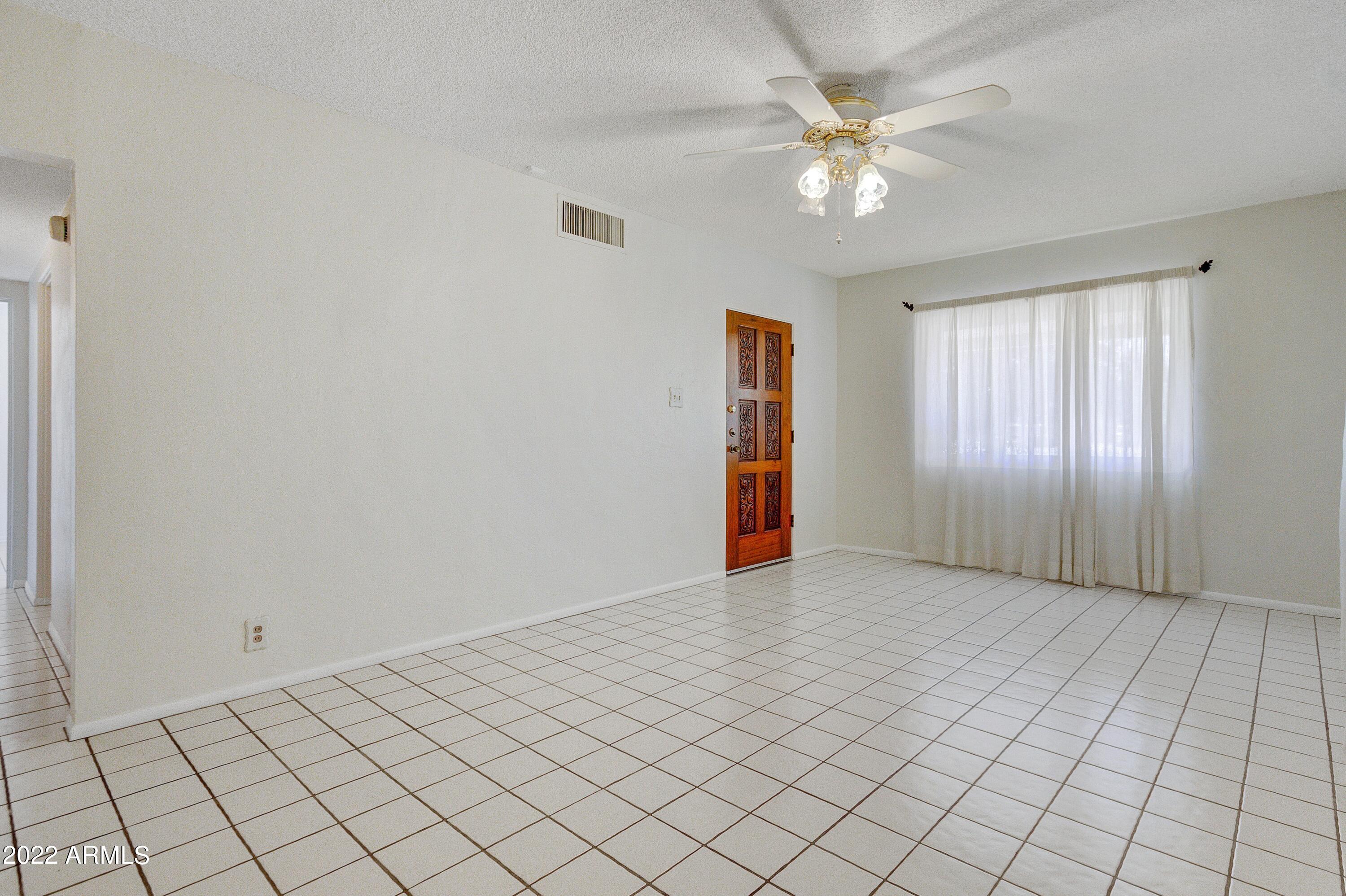104 West Carson Road Phoenix, AZ 85041 - Photo 3 of 15 003_Living Room