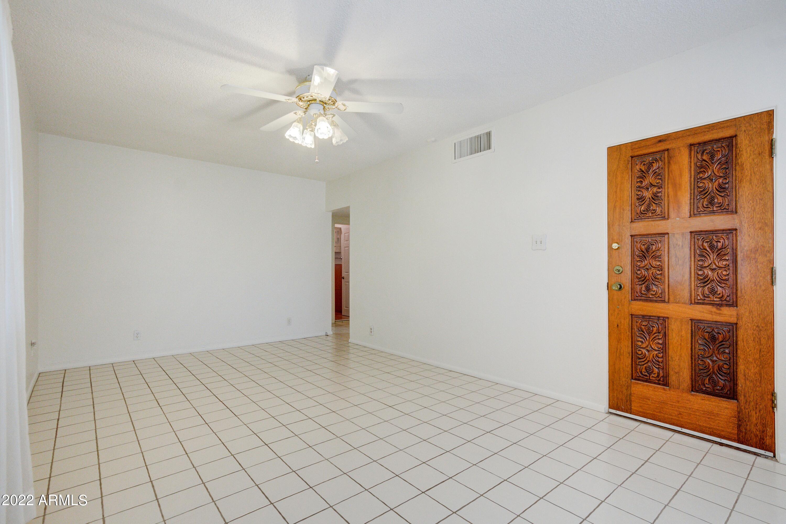 104 West Carson Road Phoenix, AZ 85041 - Photo 4 of 15 004_Living Room