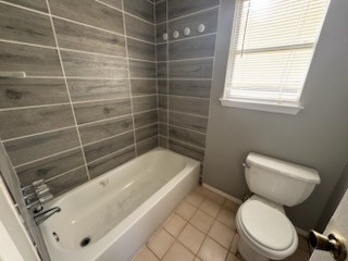 2319 Autumn Springs Lane Spring, TX 77373 - Photo 8 of 14 a bathroom with a toilet and bathtub