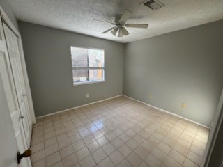 2319 Autumn Springs Lane Spring, TX 77373 - Photo 9 of 14 an empty room with windows and fan