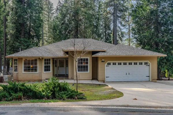 a view of a house with a garage