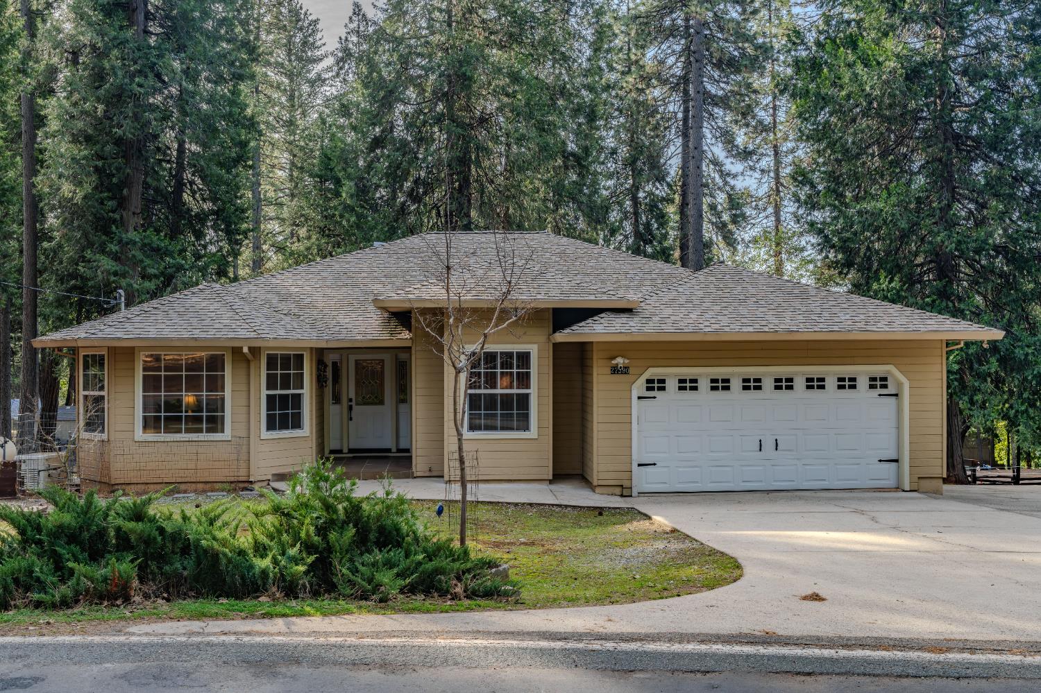 a view of a house with a garage