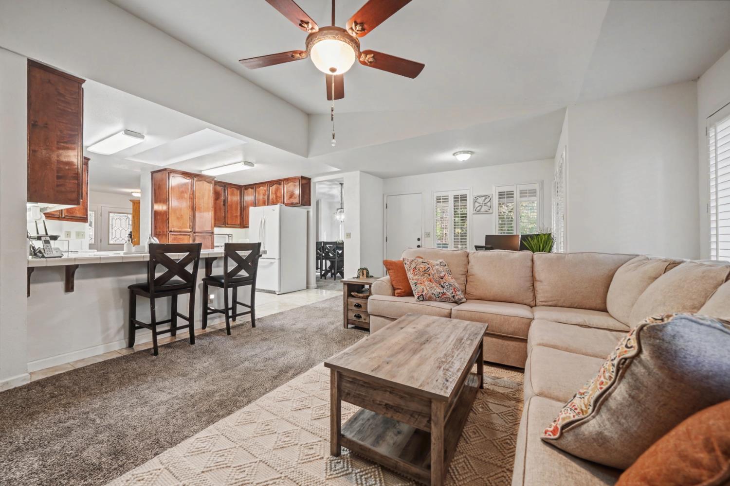 27390 Barton Road Pioneer, CA 95666 - Photo 11 of 52 a living room with furniture and a large window