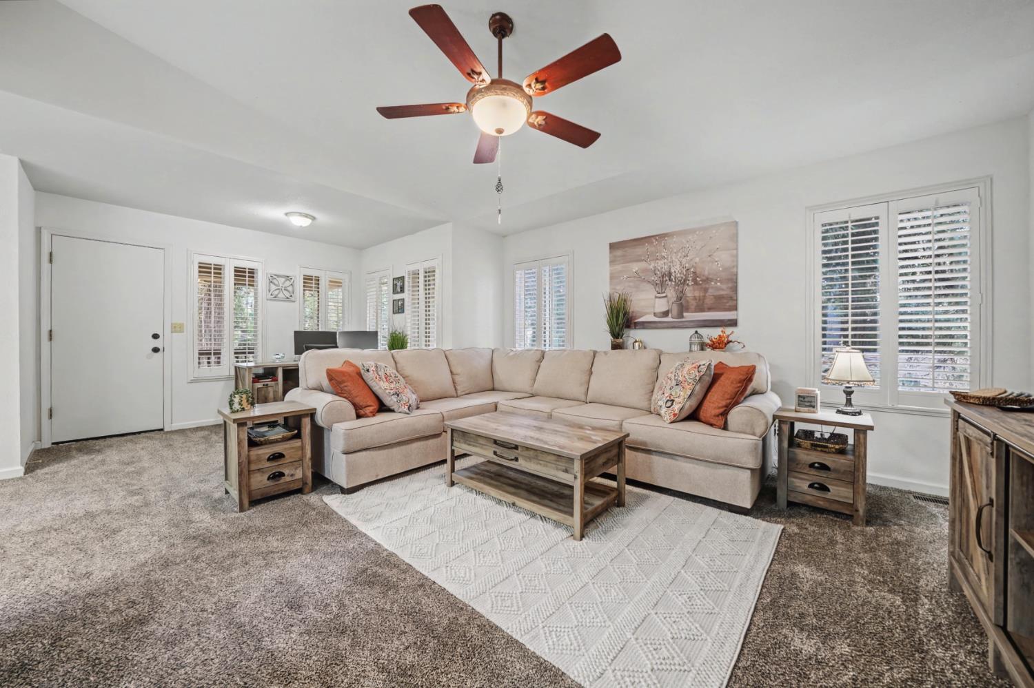 27390 Barton Road Pioneer, CA 95666 - Photo 12 of 52 a living room with furniture and a large window