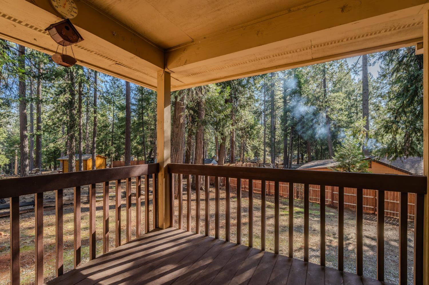 27390 Barton Road Pioneer, CA 95666 - Photo 45 of 52 a view of a porch with wooden floor