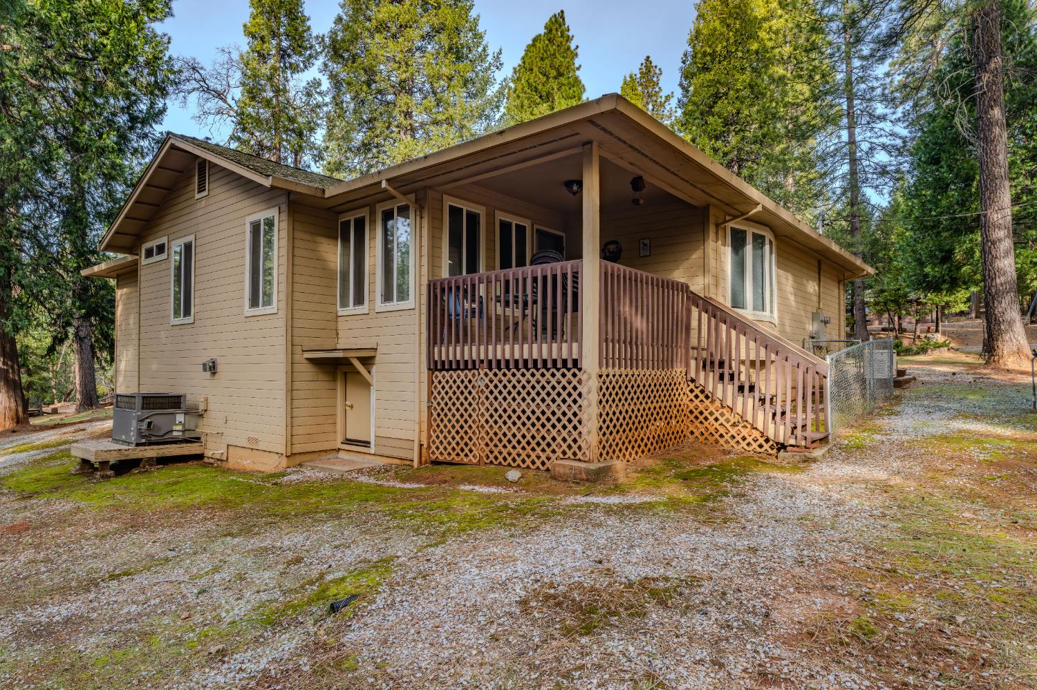 27390 Barton Road Pioneer, CA 95666 - Photo 47 of 52 a view of a house with a yard